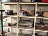 a shelf with many items on it in a garage