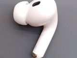 a pair of airpods sitting on top of a table