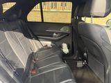 the back seats of a car are empty in the back of the car