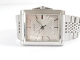 an image of a close up of a wrist watch on a white surface