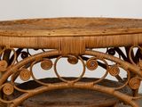 a wicker table with a wicker top and a wicker bottom