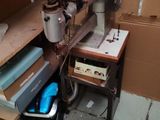 a sewing machine that is sitting in a room