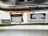 a dirty washer that has a lot of rust on it