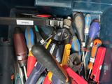 many different tools in a blue container together