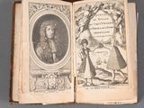 an old book with a picture of a man and a woman in it