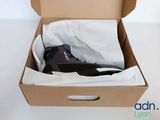 a box with a pair of shoes inside of it