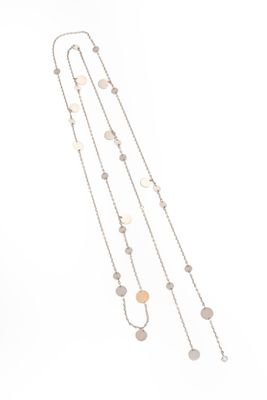 a close up of a long necklace on a white background