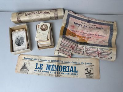 some old papers are sitting on top of a table