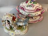 three different types of porcelain figurines sitting on a table