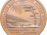 an image of a bronze medal with a picture of a tree on it