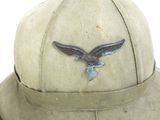 a hat with a bird on it and a hat with a bird on it