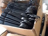 a lot of black umbrellas in a cardboard box