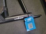 a close up of a bike seat with a tag on it