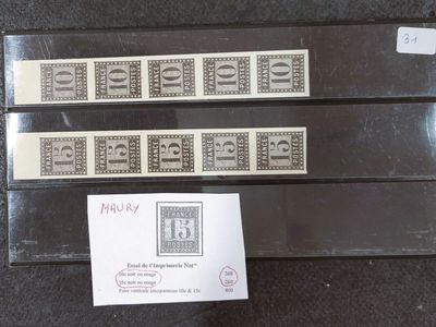 three stamps on a table with a price tag and a sticker