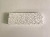 a white piece of paper on a white surface