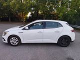 a picture of a white car parked in a parking lot