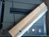 a cardboard box sitting on top of a laptop computer