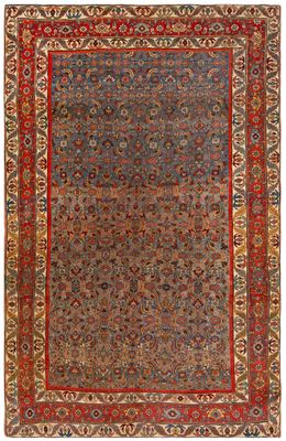 un tapis persan ancien avec une bordure bleue et rouge