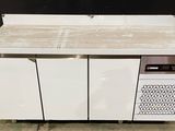 an image of a kitchen counter with a microwave on it