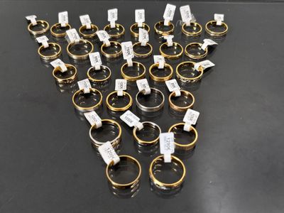 a lot of rings that are on the table