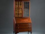 an antique mahogany secretary ' s desk with glass doors