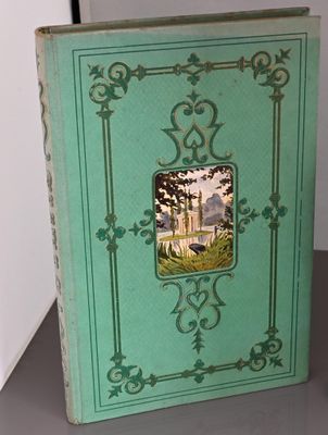 a green book with a picture of a castle on it