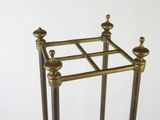 an image of a metal table with a glass top and a metal base