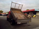 a truck that is sitting in the parking lot