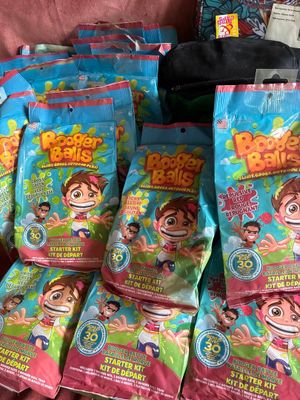 many bags of food that are sitting on a table