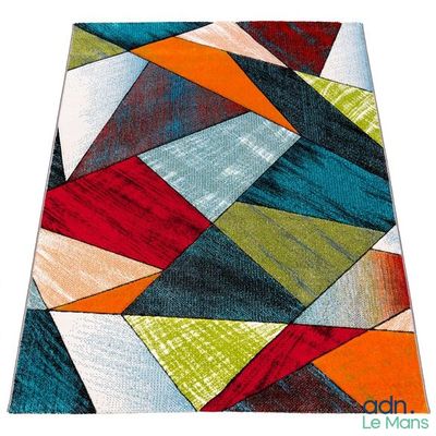 a close up of a colorful rug on a white background