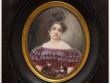 an oval portrait of a woman in a red dress in a black frame