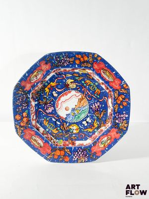 a blue plate with a picture of a horse on it