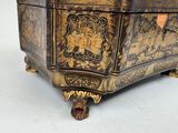 a wooden box that has a design on it