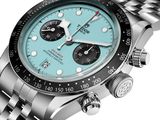 a close up of a watch with a blue dial on a bracelet