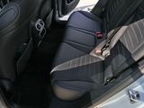 a black seat in the back of a white car