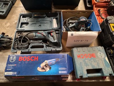 a box of tools sitting on a table next to other tools