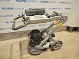 an image of a machine that is sitting on the ground