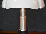 a lamp that is sitting on top of a table