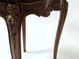 a wooden table with a marble top on a white background