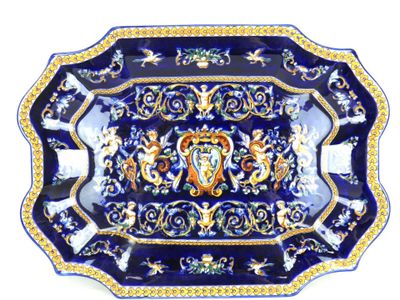 une photo d'un plateau bleu et or orné d'une image de lion