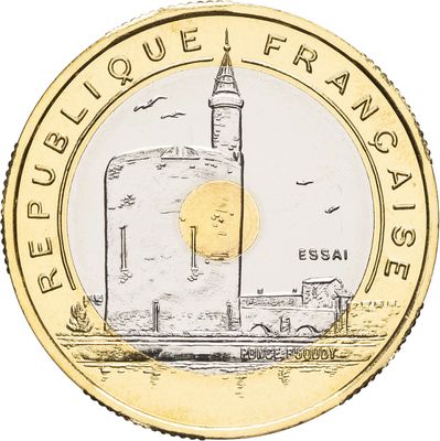 sur le côté de la pièce figure l'image d'un phare