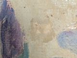 a close up of a vase with flowers painted on it