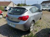 a silver car that is parked in a lot