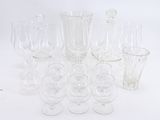 a lot of empty wine glasses sitting on a table