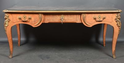 Grand bureau double-face en bois de placage, ouvrant par deu…