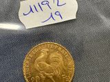 a close up of a coin in a plastic bag on a table
