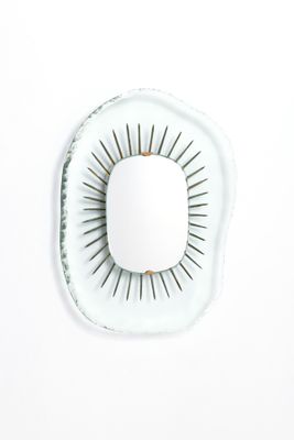a white plate with a circular design on it