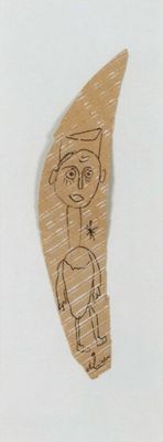 a drawing of a person on a piece of cardboard