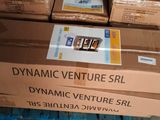 boxes stacked on top of a pallet in a warehouse