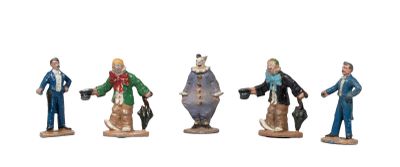 four figurines of men dressed in different outfits